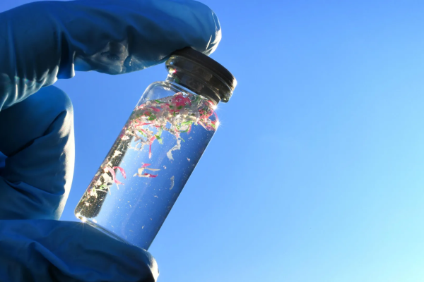 a small bottle filled with water and plastic