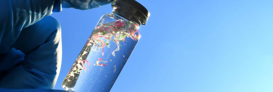 a small bottle filled with water and plastic