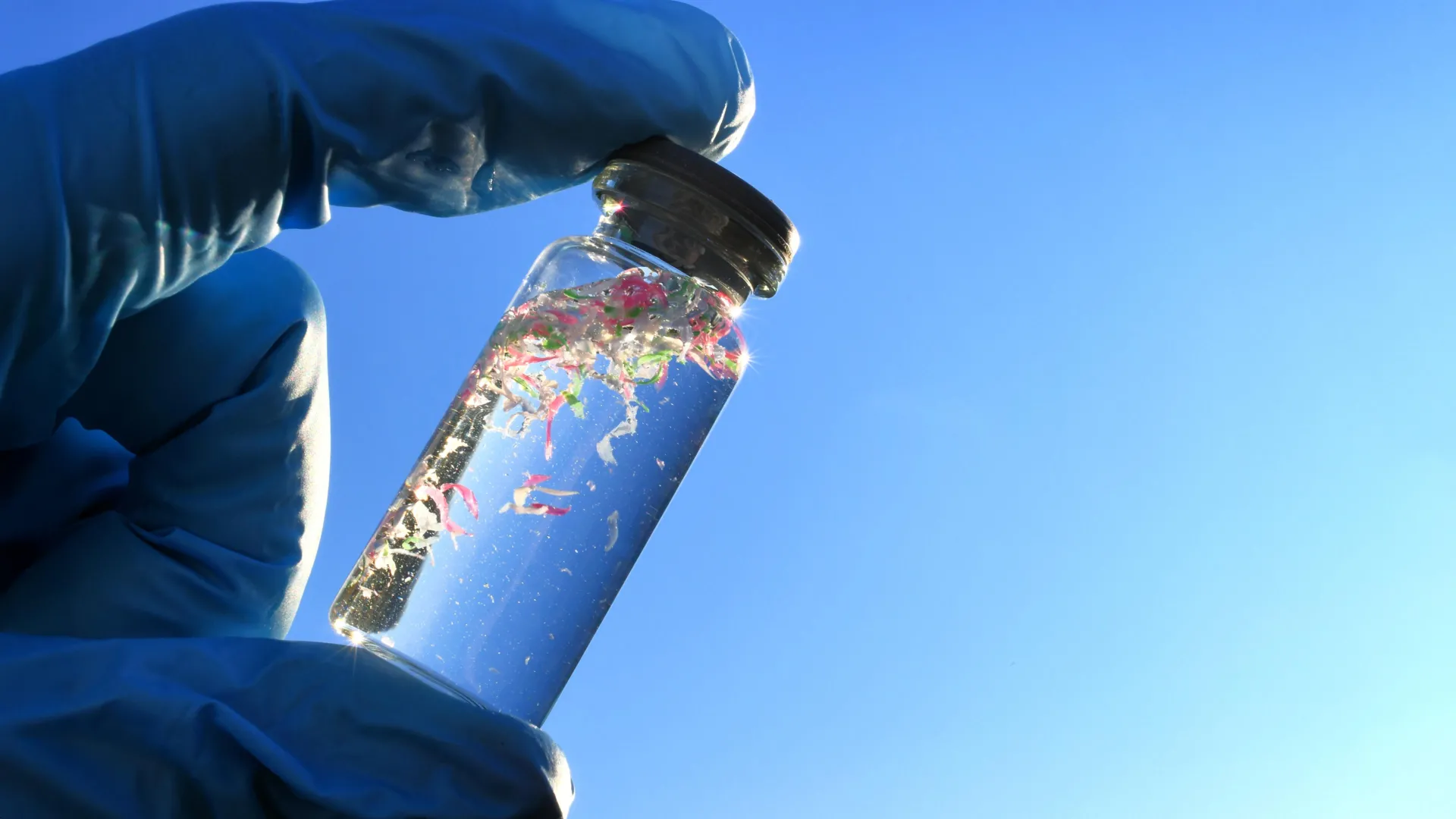 a small bottle filled with water and plastic